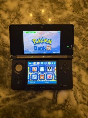 Nintendo 3DS Console Black With Pokémon Bank, Poke Transporter, & Games